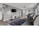 Cozy living room with fireplace, television, and comfortable furniture at 4605 Clairmont Dr, Columbus, IN 47203
