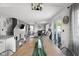 Open concept dining/living space with a modern chandelier at 4605 Clairmont Dr, Columbus, IN 47203