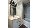 Bathroom featuring modern vanity with gray subway tile in the shower at 473 Mariposa Trl, Carmel, IN 46032