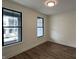 Bedroom featuring lots of natural light and luxury vinyl flooring at 473 Mariposa Trl, Carmel, IN 46032