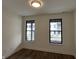 Bedroom featuring lots of natural light and luxury vinyl flooring at 473 Mariposa Trl, Carmel, IN 46032