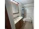 Cozy bathroom featuring a vanity with ample counter space and a bathtub at 530 Denny Dr, Mooresville, IN 46158