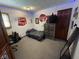 Bedroom featuring a dresser and decor, with a door leading to another room at 530 Denny Dr, Mooresville, IN 46158
