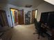 Bright bedroom featuring a desk, chairs, TV, and comfortable seating at 530 Denny Dr, Mooresville, IN 46158