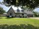 Charming two-story home featuring a welcoming front porch and well-manicured lawn at 530 Denny Dr, Mooresville, IN 46158