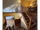 Home foyer featuring a staircase with wood and metal railings, enhanced by natural lighting at 530 Denny Dr, Mooresville, IN 46158