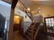Foyer featuring hardwood floors and stairs leading up to a second-floor loft at 530 Denny Dr, Mooresville, IN 46158