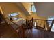 Elegant foyer featuring a grand staircase, chandelier lighting, and stone accents at 530 Denny Dr, Mooresville, IN 46158