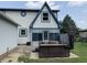 Exterior view of home with a covered back porch featuring a modern hot tub at 530 Denny Dr, Mooresville, IN 46158