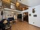 Spacious living room with vaulted ceilings, hardwood floors, and plenty of natural light at 530 Denny Dr, Mooresville, IN 46158