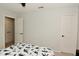 Neutral bedroom with carpeting features doors and closets with hardware and a dinosaur-themed bedspread at 5456 Reston Dr, Plainfield, IN 46168
