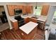 Modern kitchen featuring stainless appliances, a practical island, and plenty of cabinet storage at 5456 Reston Dr, Plainfield, IN 46168