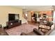 Spacious living room flows into the kitchen and dining area, offering an open floor plan at 5456 Reston Dr, Plainfield, IN 46168