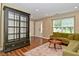 Bright living room with sofa, coffee table and large cabinet for storage and display at 5456 Reston Dr, Plainfield, IN 46168