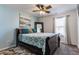 Comfortable bedroom with ample light from a large window and a large mirror at 5794 Cherrywood Ln, McCordsville, IN 46055