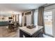 Bright kitchen island open to the dining and living area and featuring modern stainless appliances at 5794 Cherrywood Ln, McCordsville, IN 46055