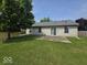 Large backyard with patio and shed, ideal for outdoor entertaining at 5825 Sapelo Dr, Indianapolis, IN 46237