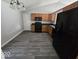Spacious kitchen with matching black appliances, durable floors and ample cabinet space at 5825 Sapelo Dr, Indianapolis, IN 46237