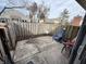 This backyard has a concrete patio, wood fence, and outdoor furniture at 5941 Deerwood Ct, Indianapolis, IN 46254