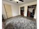 Spacious bedroom with two closets, ample natural light, and vinyl floors at 5941 Deerwood Ct, Indianapolis, IN 46254