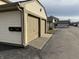 This detached 2-car garage is accessible from the alley at 5941 Deerwood Ct, Indianapolis, IN 46254
