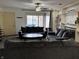 A cozy living room featuring a comfortable seating area, a fireplace, and bright lighting at 5941 Deerwood Ct, Indianapolis, IN 46254