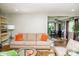 Spacious living room with an open layout, seamlessly flowing into the dining area at 6180 Winnpeny Ln, Indianapolis, IN 46220