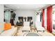 Well-lit living space featuring hardwood floors and neutral decor at 6180 Winnpeny Ln, Indianapolis, IN 46220