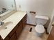 Functional bathroom featuring a toilet, sink, and vanity at 641 S Grant St, Brownsburg, IN 46112