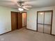 Bedroom with ceiling fan, dual closets, and ample space at 641 S Grant St, Brownsburg, IN 46112