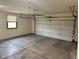 Spacious garage with ample room for parking and storage, featuring a garage door opener at 641 S Grant St, Brownsburg, IN 46112
