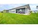Relaxing back porch with outdoor seating, ideal for enjoying the backyard view at 655 N Sobota Way, Trafalgar, IN 46181
