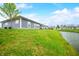 Backyard exterior view of a blue sided home with lawn at 655 N Sobota Way, Trafalgar, IN 46181