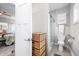 En-suite bathroom with a walk-in shower featuring glass doors and a built-in wall storage cabinet at 655 N Sobota Way, Trafalgar, IN 46181