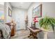Welcoming entryway with stylish decor, wood-look flooring, and a view into the living room at 655 N Sobota Way, Trafalgar, IN 46181