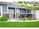 Inviting front porch with stone accents and comfortable seating, perfect for enjoying the outdoors at 655 N Sobota Way, Trafalgar, IN 46181