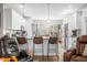 Eat in kitchen with bar stool seating at the counter and modern stainless appliances at 655 N Sobota Way, Trafalgar, IN 46181
