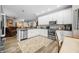 Modern kitchen with white cabinets, stainless steel appliances, and an open concept layout at 655 N Sobota Way, Trafalgar, IN 46181