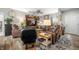 Inviting living room with comfortable leather seating, a decorative rug, and an entertainment center at 655 N Sobota Way, Trafalgar, IN 46181