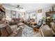 Comfortable living room with plush leather seating and ample space for entertaining at 655 N Sobota Way, Trafalgar, IN 46181