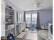 Charming bedroom with natural light from the window, and organized storage solutions in the shelving unit at 6608 Sonesta Dr, Indianapolis, IN 46217