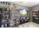 Unique room with collectible decor, hardwood floors, and a flatscreen television at 6608 Sonesta Dr, Indianapolis, IN 46217