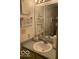 Well-lit bathroom with a functional sink and neutral decor at 6730 Nw Shanghai Cir, Indianapolis, IN 46268