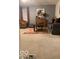 Comfortable living room with a fireplace and cozy decor at 6730 Nw Shanghai Cir, Indianapolis, IN 46268