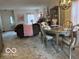 Open-concept living and dining area with ample space for entertaining guests at 6730 Nw Shanghai Cir, Indianapolis, IN 46268