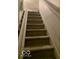 Carpeted stairs leading to the upper level of the home at 6730 Nw Shanghai Cir, Indianapolis, IN 46268
