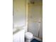 Bathroom featuring a shower with gold trim and a white toilet at 6801 Shalimar Ct, Indianapolis, IN 46214