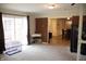Bright and spacious living room with hardwood floors and access to multiple rooms at 6801 Shalimar Ct, Indianapolis, IN 46214