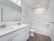 Modern bathroom with double vanity, quartz countertops, updated fixtures, and combination shower and tub at 7151 Firestone Rd, Whitestown, IN 46052
