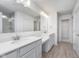 Stylish bathroom with double vanity, quartz countertops, and a glass-enclosed shower at 7151 Firestone Rd, Whitestown, IN 46052